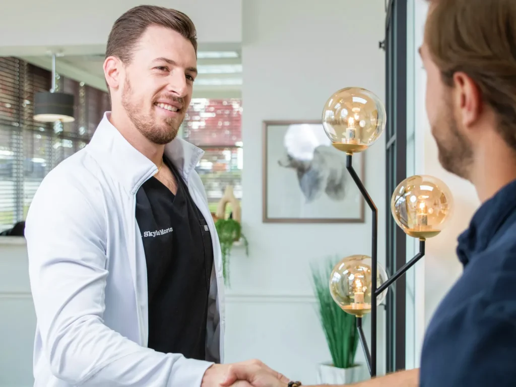 Dr. Morton welcoming a patient to his privately-owned dental practice in Lawrenceburg, TN