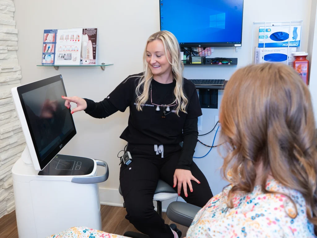 Dr. Brittany Simmons helping a patient experiencing tooth pain – emergency dentist in Lawrenceburg, TN at Dentistry of Lawrenceburg